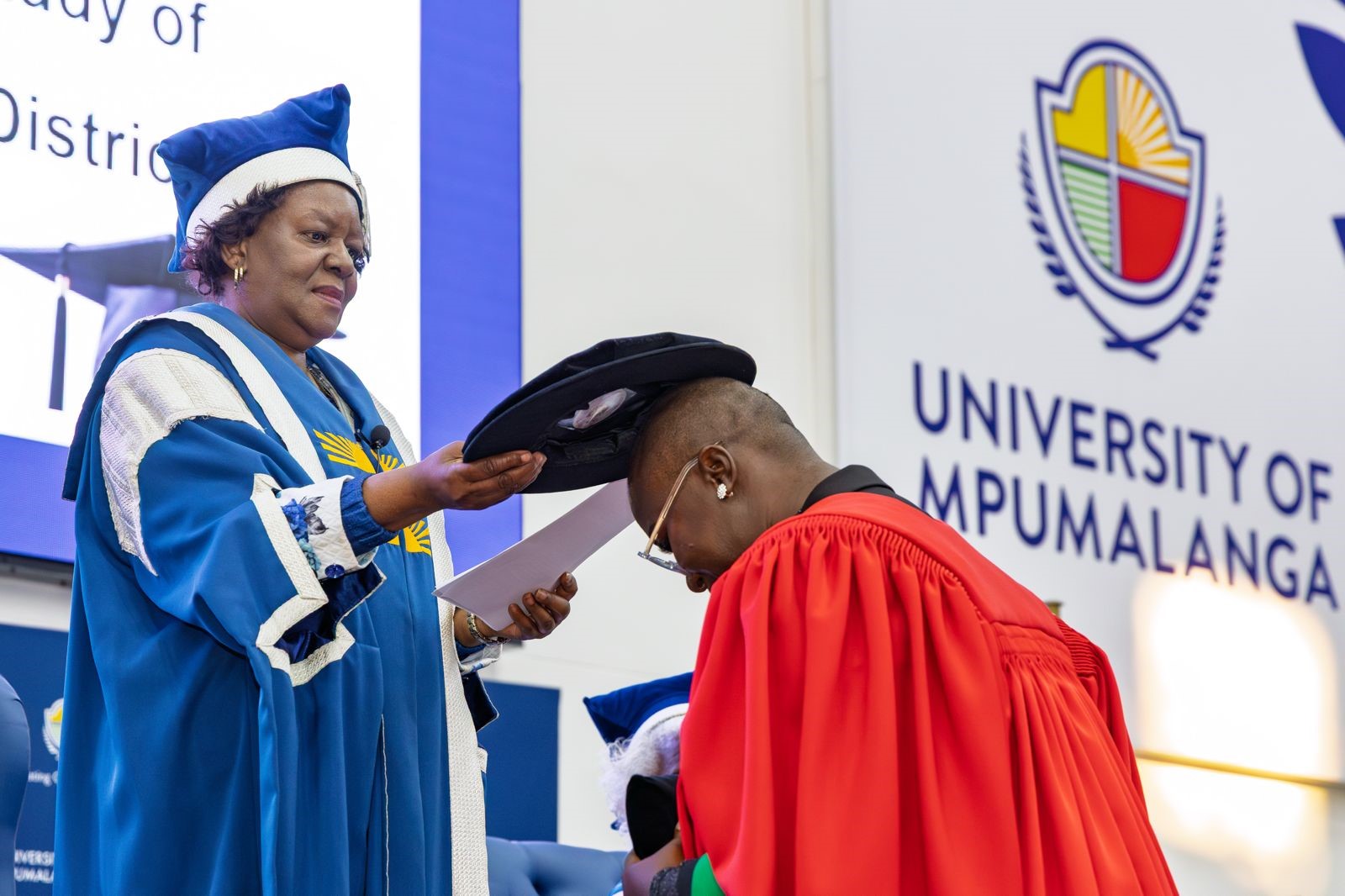 UMP-Vice-Chancellor,-Prof-Thoko-Mayekiso-capping-Dr-Khumbelo-Mabadahanye-during-the-10th-graduation-ceremony.jpg